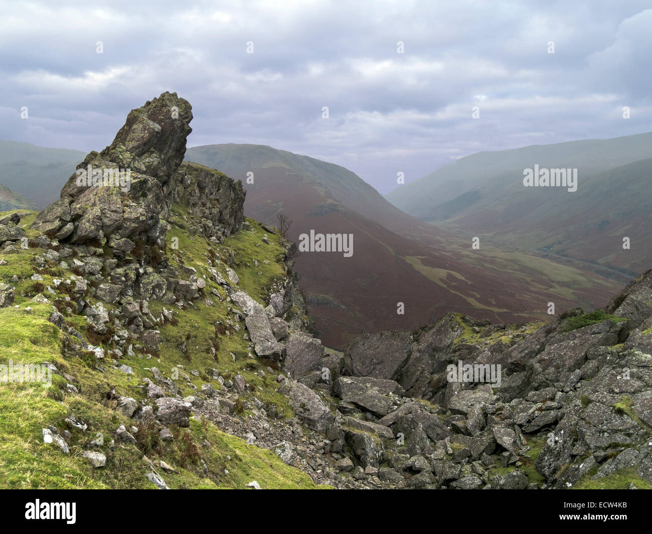 Howitzer rock formation on the summit of Helm Crag, with Thirlmere valley beyond, Grasmere, Lake District, Cumbria, England,UK Stock Photo