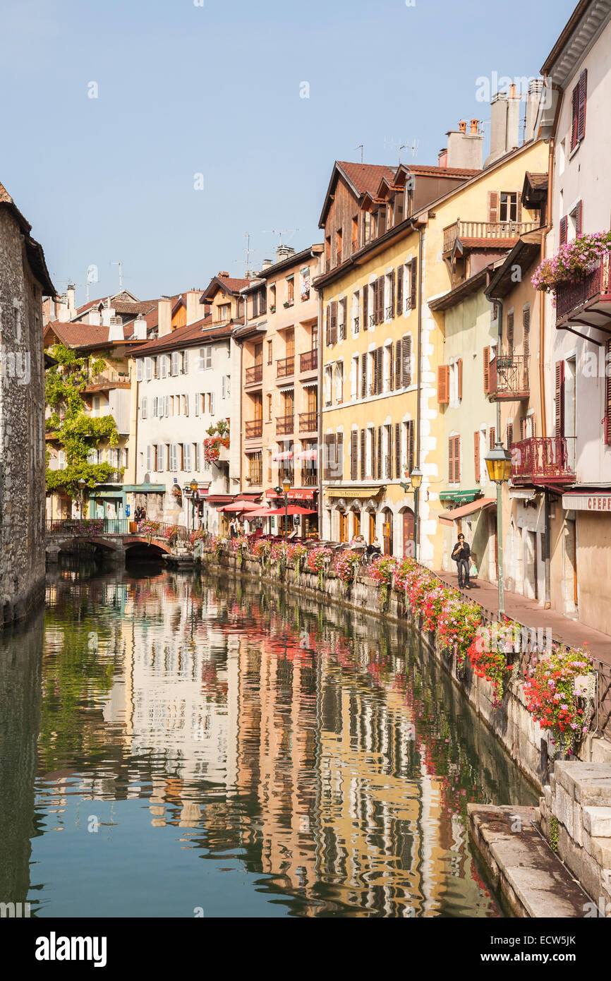 Annecy old town. Colourful historic buildings and promenade reflected in the Thiou river