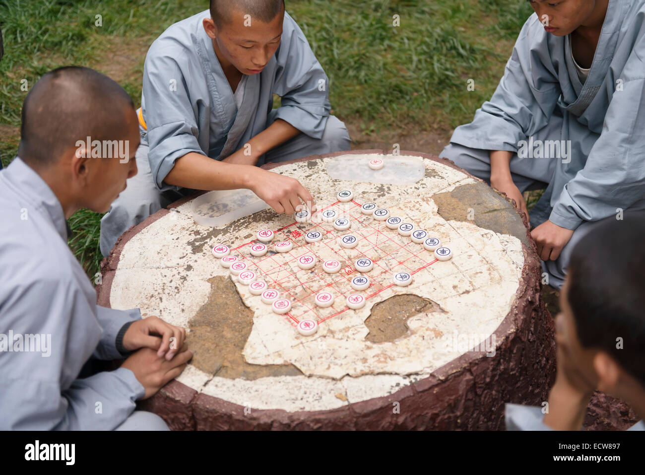 Shaolin martial arts school students playing Xiangqi Chinese chess