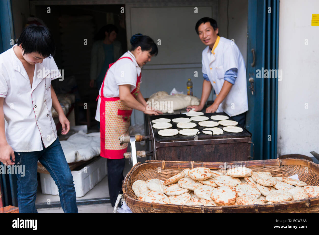 Small family business selling flat bread at a food market in Zhengzhou, Henan, China Stock Photo
