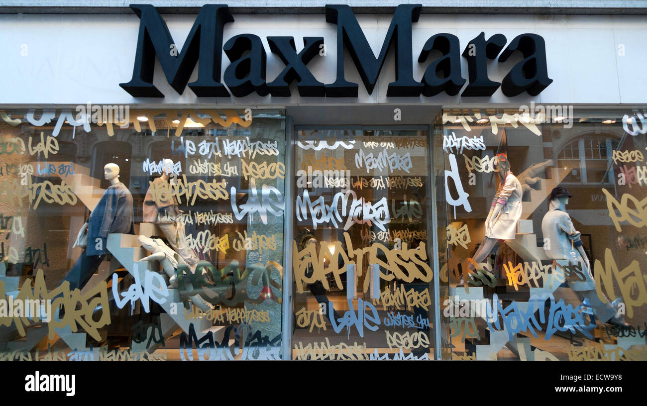 Temporary MaxMara store window during refurbishment of main store on Old Bond Street London, UK  2014 KATHY DEWITT Stock Photo