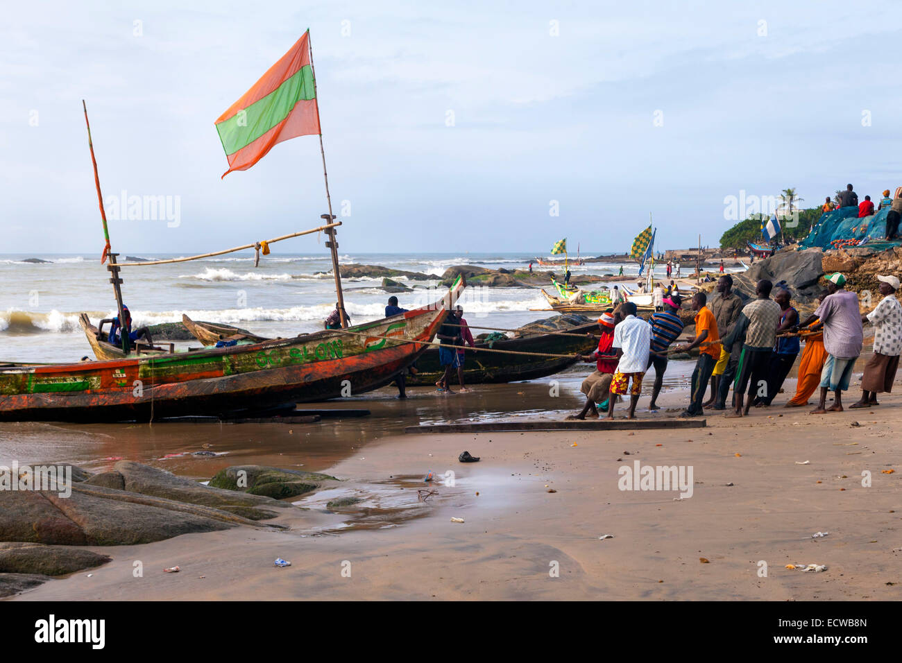 Winneba, fishing village on the Gulf of Guinea, near Accra, Ghana, Africa. Locals pulling