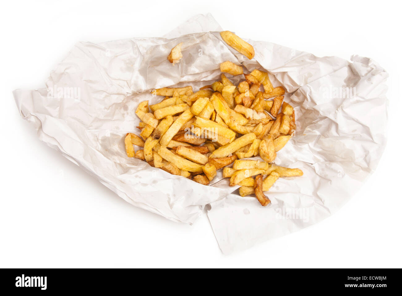 Large portion of chips from the fish and chip shop. Stock Photo