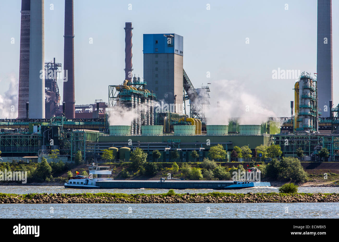 Coking plant Schwelgern, in Duisburg, Germany, river Rhine, cargo ship, Stock Photo