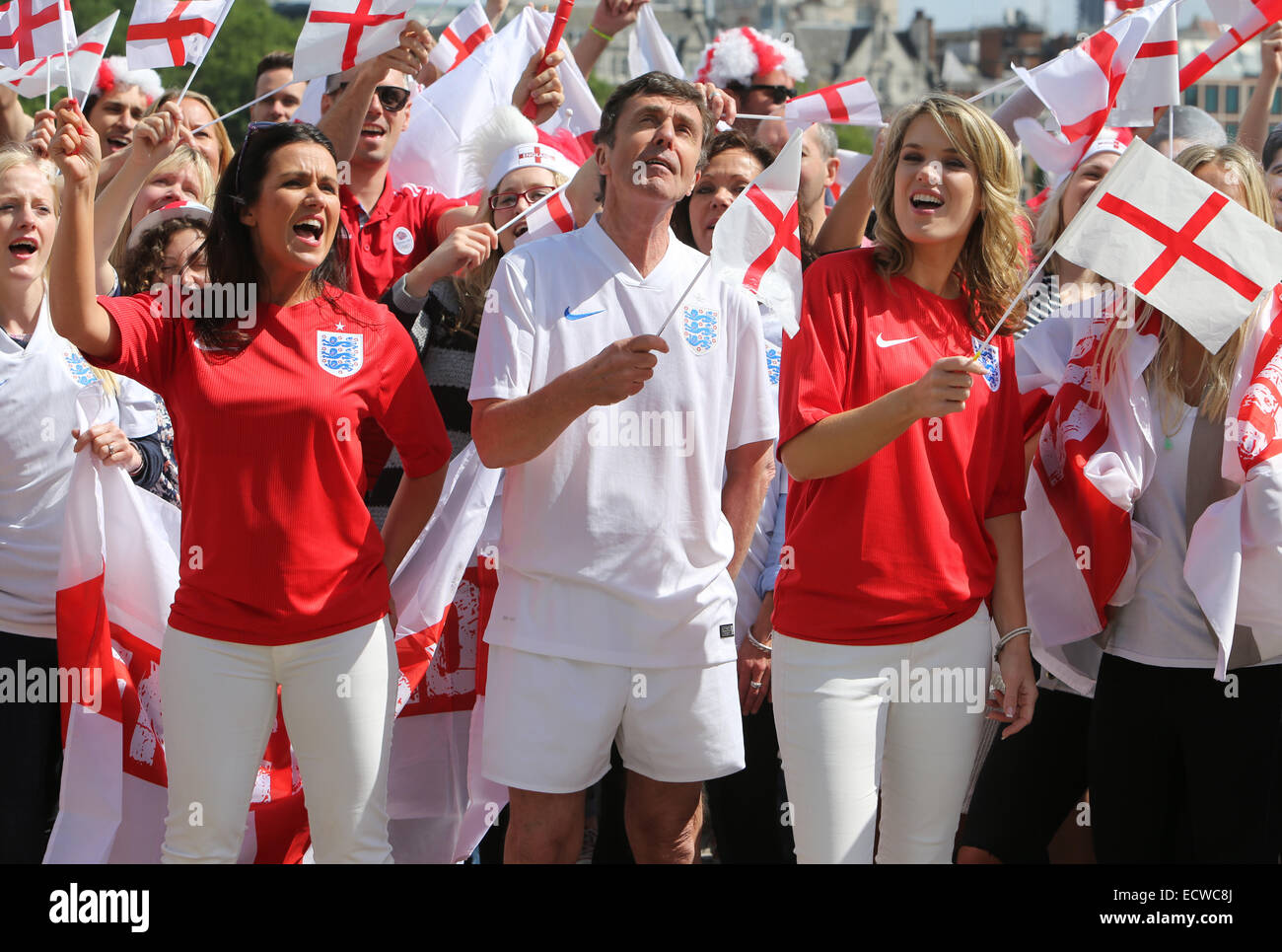 Susanna Reid and Charlotte Hawkins filming a football song outside ITV