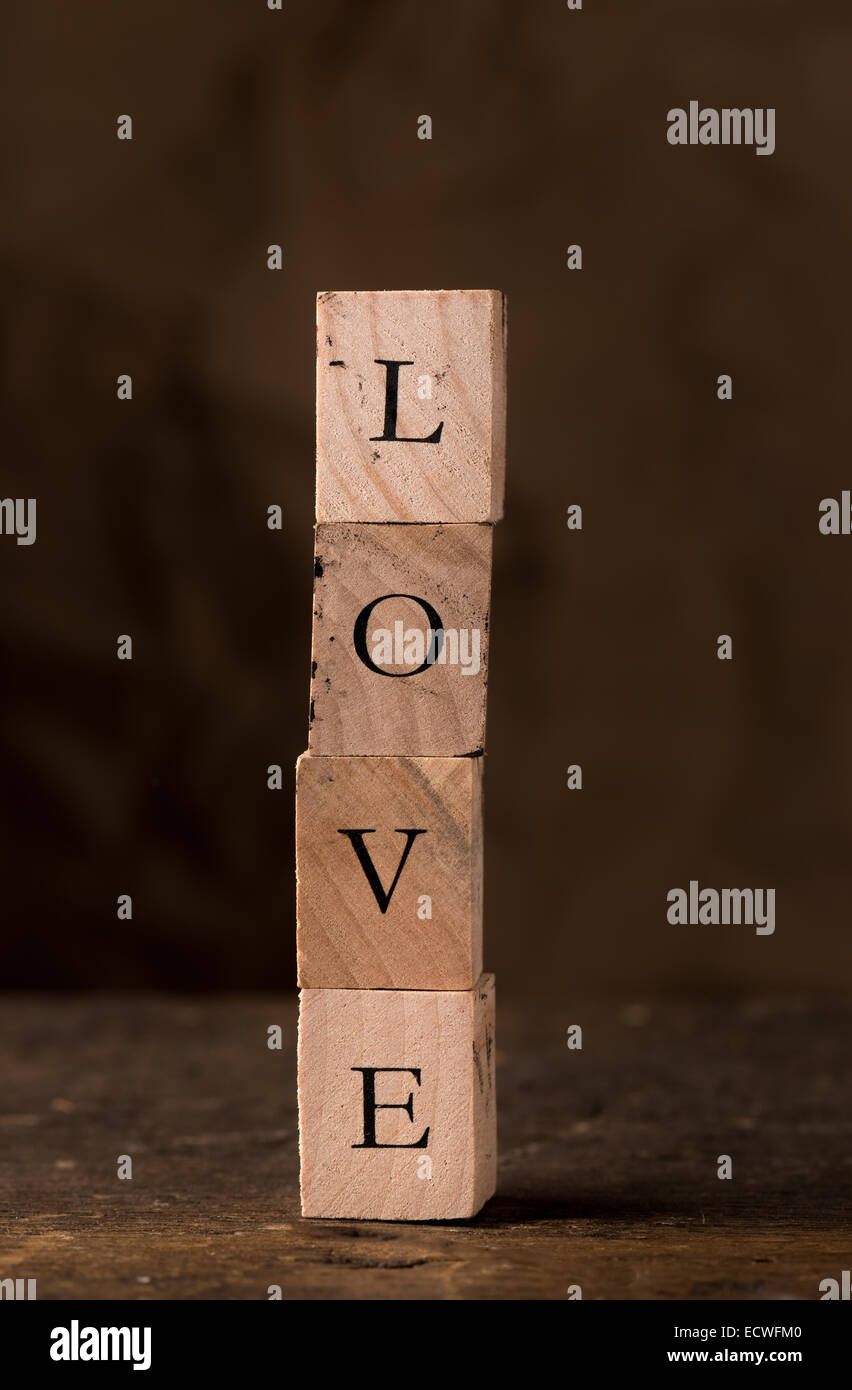 Stamping blocks with the word LOVE spelled out  stacked Stock Photo