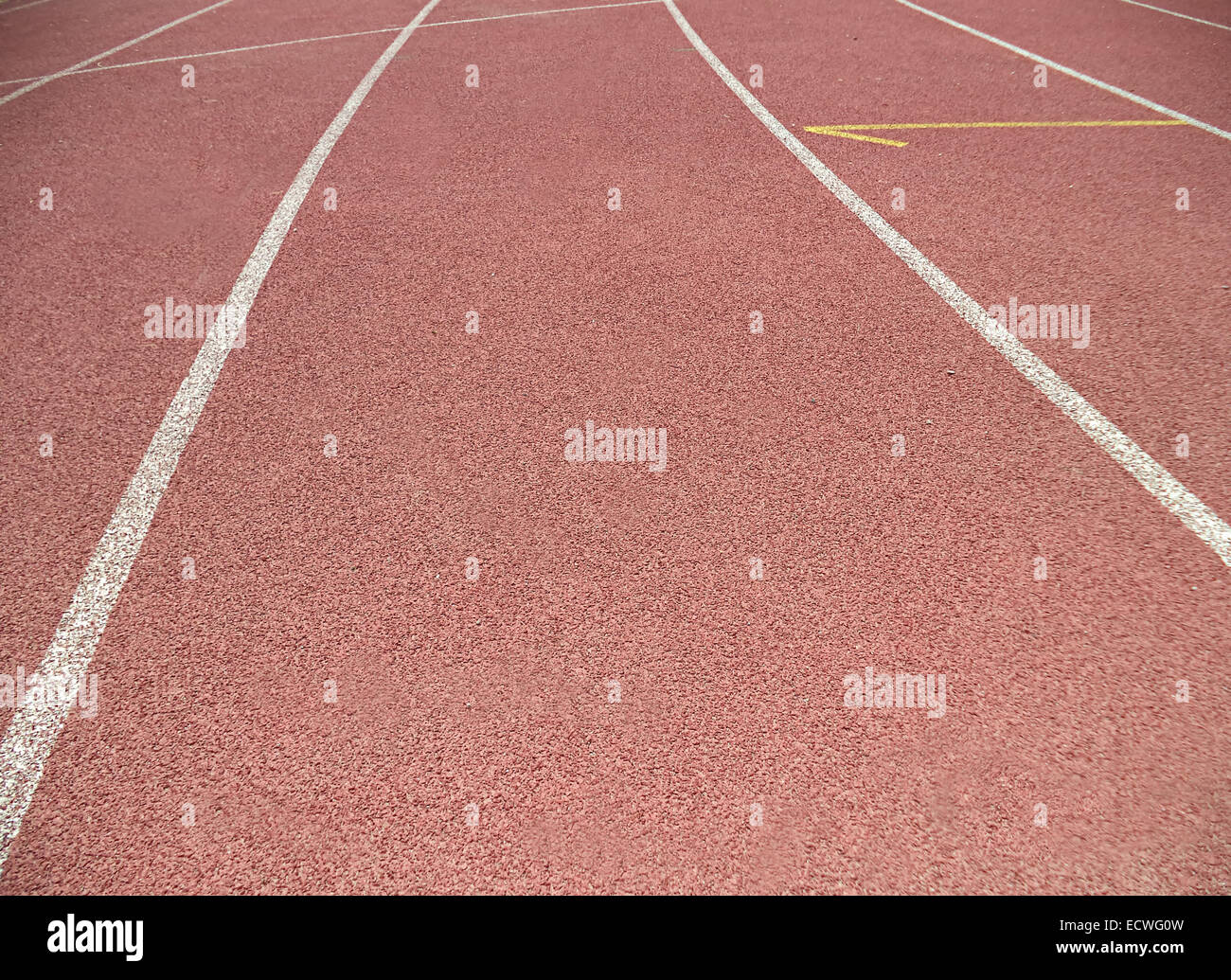 Red running track with lines Stock Photo - Alamy