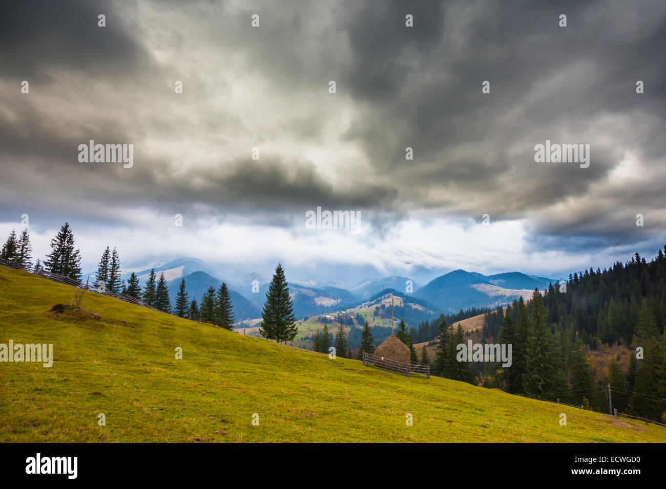 storm clouds over the mountains. raine nature Stock Photo - Alamy