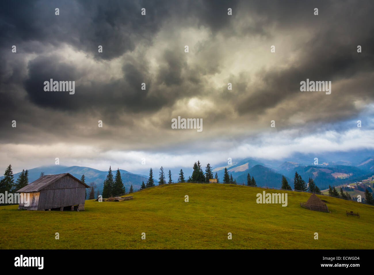 storm clouds over the mountains. raine nature Stock Photo - Alamy