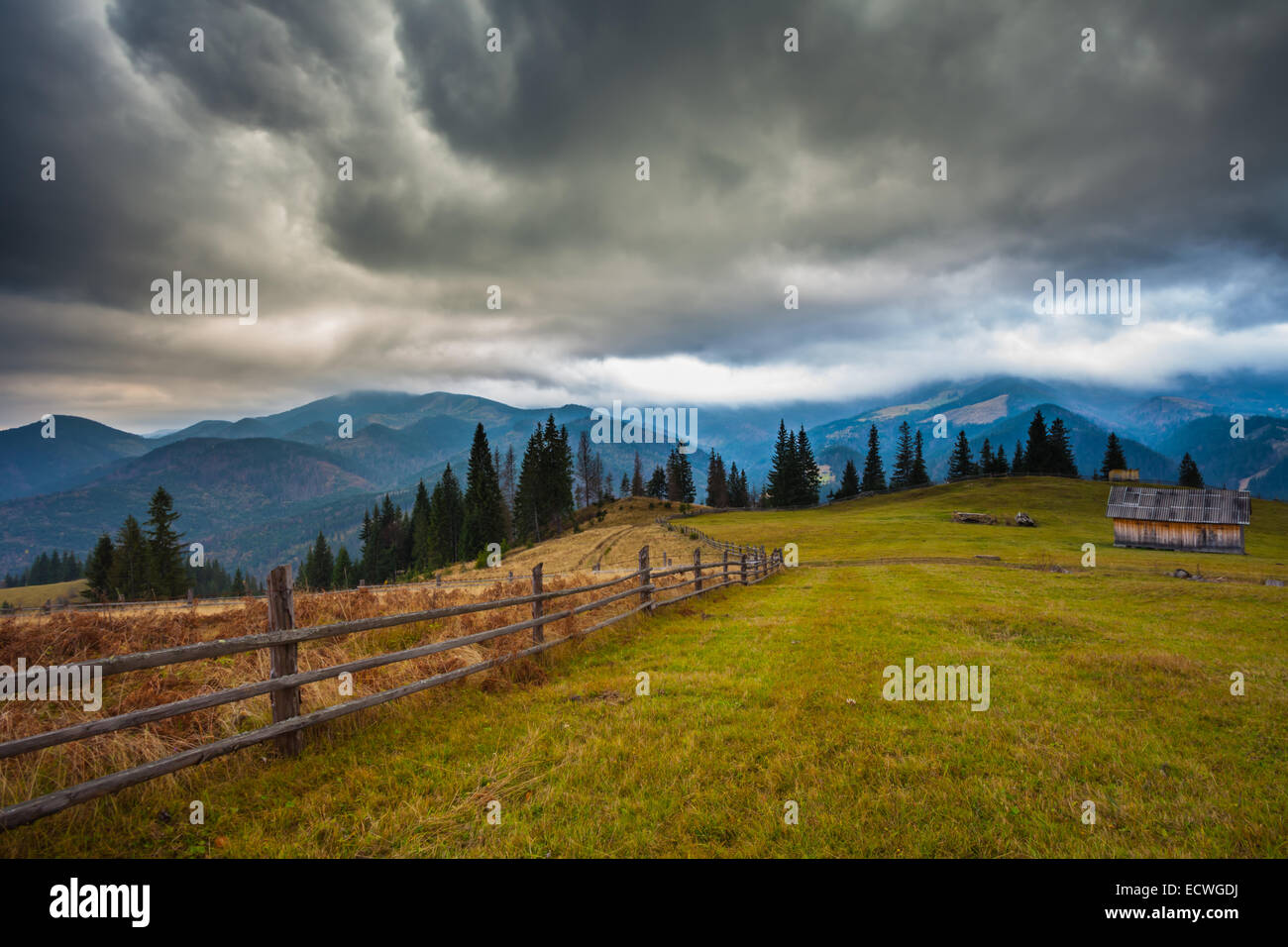 storm clouds over the mountains. raine nature Stock Photo - Alamy