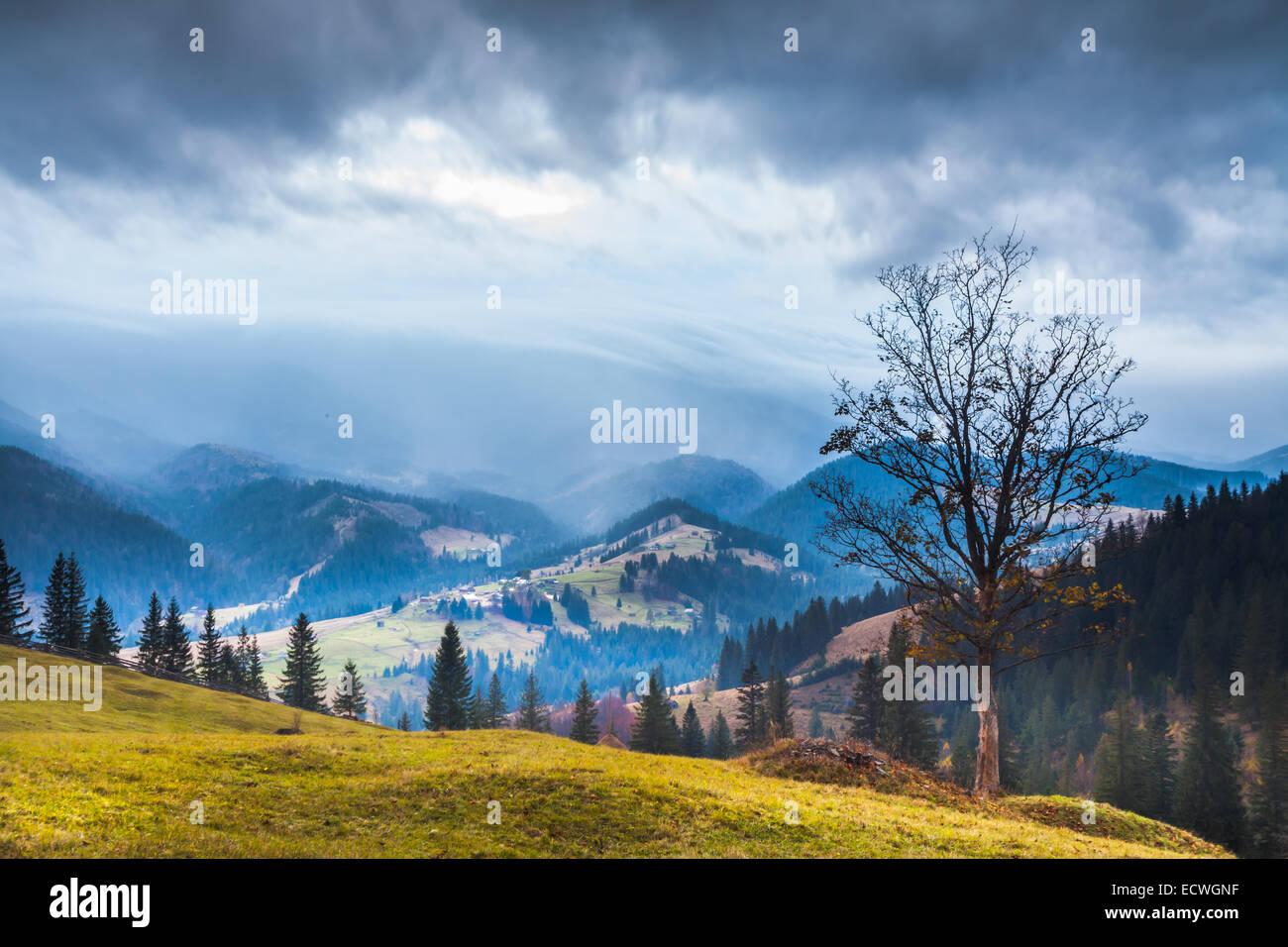 storm clouds over the mountains. raine nature Stock Photo - Alamy