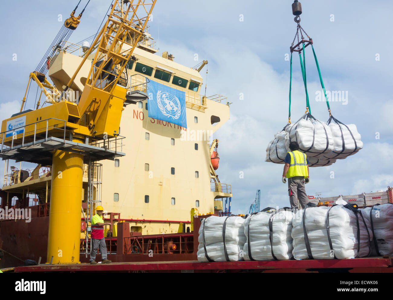 WFP rice bound for Africa being loaded onto ship in Las Palmas port from UNHCR, United Nations Humanitarian Response store on Gran Canaria Stock Photo