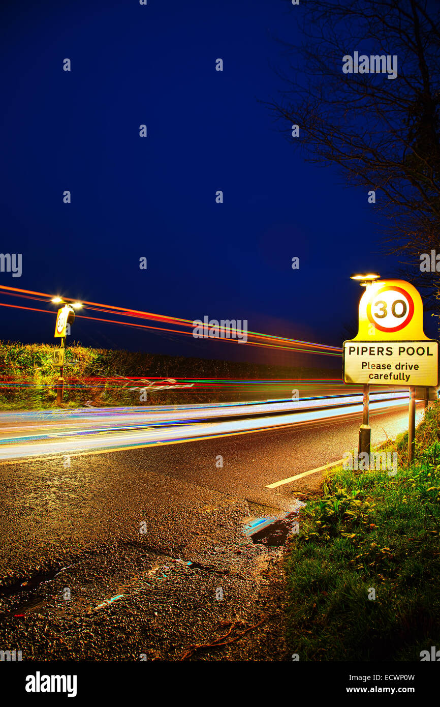 The main road through Pipers Pool near Launceston at night Stock Photo