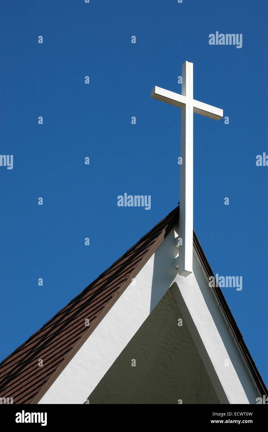 Wooden cross on top of a church Stock Photo