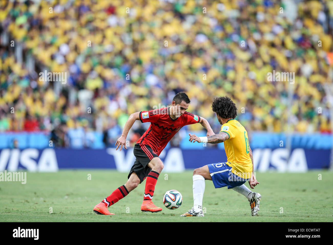 2014 FIFA World Cup - Brazil v Mexico - held at Castelao Stadium. The game ended in a 0-0 draw.  Featuring: Paul Aguilar,Marcelo Where: Fortaleza, CE, Brazil When: 17 Jun 2014 Stock Photo