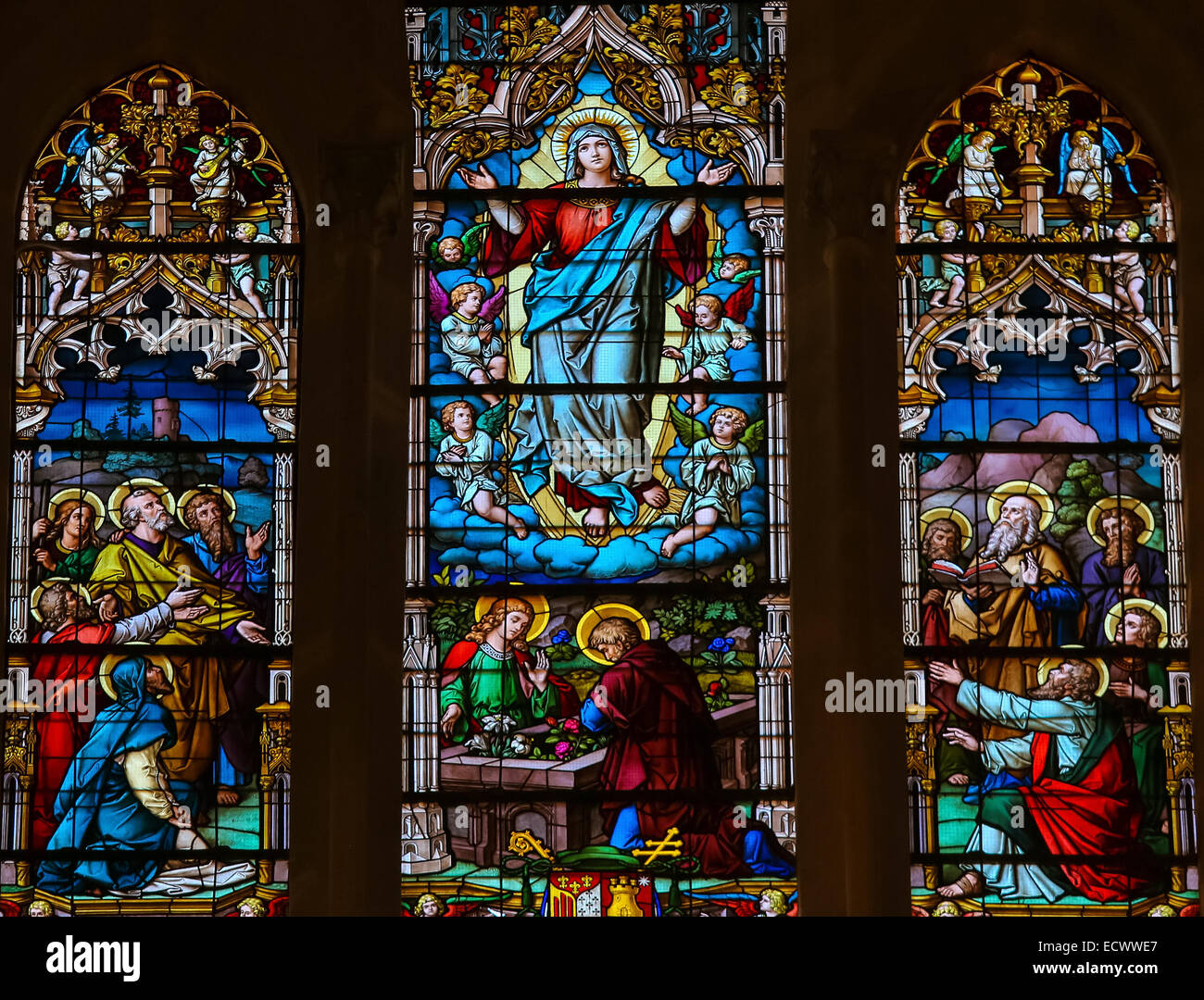 Stained glass window depicting the Assumption of Mary in the cathedral of Burgos, Castille, Spa Stock Photo