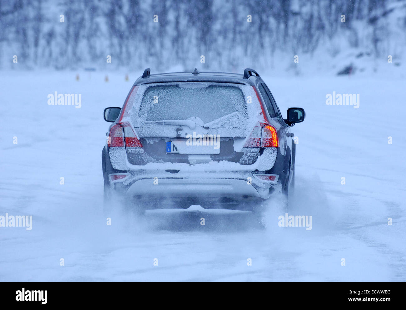 Car driving on snow and ice near the arctic circle in Sweden. Volvo