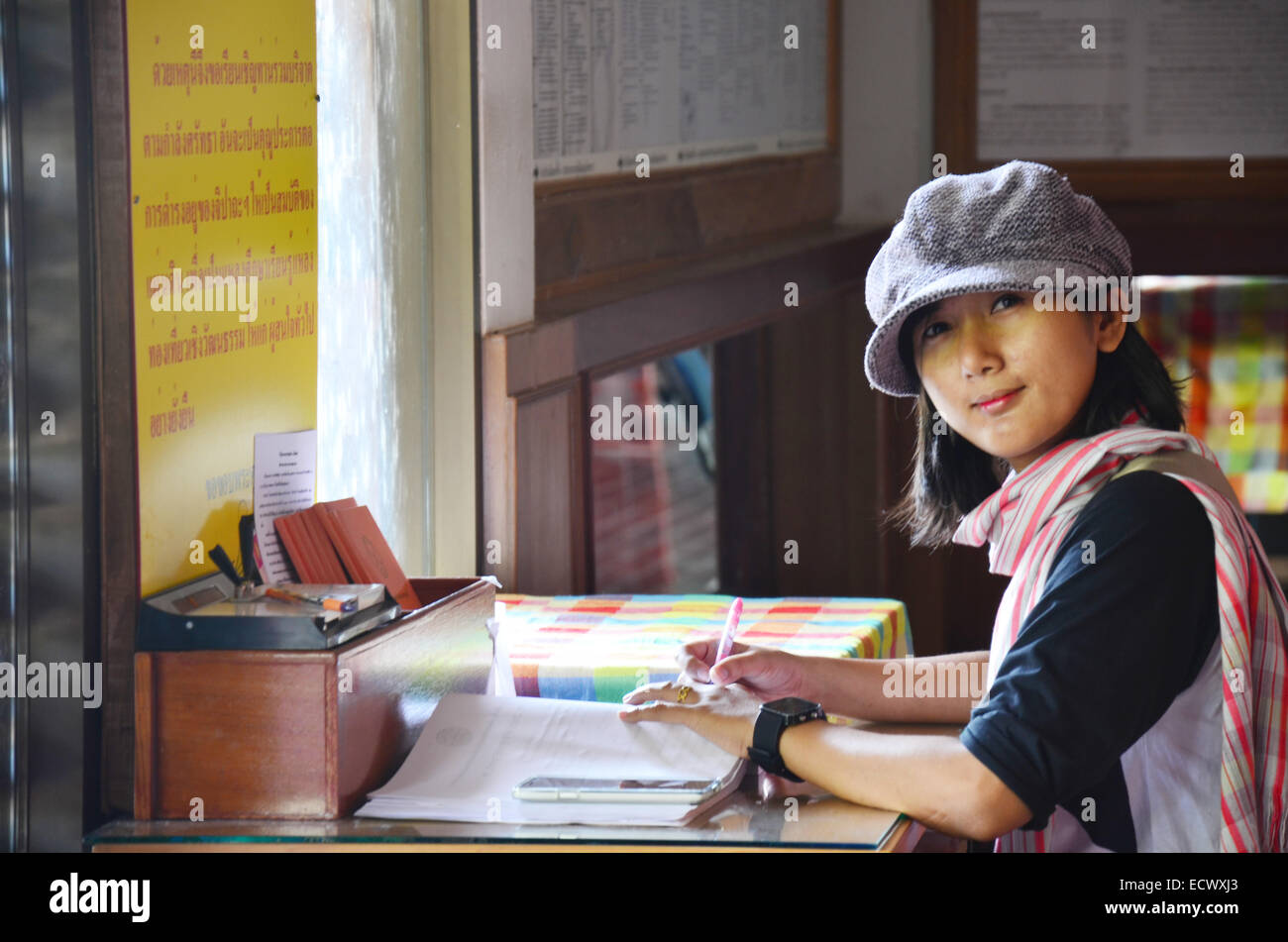 Thai women write memory on book Stock Photo - Alamy