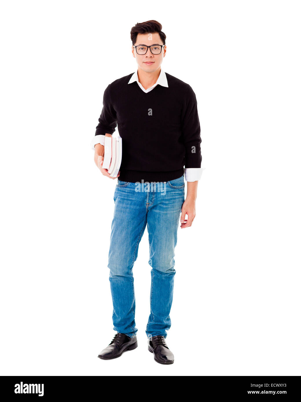 Full length portrait of smiling school boy holding books Stock Photo ...