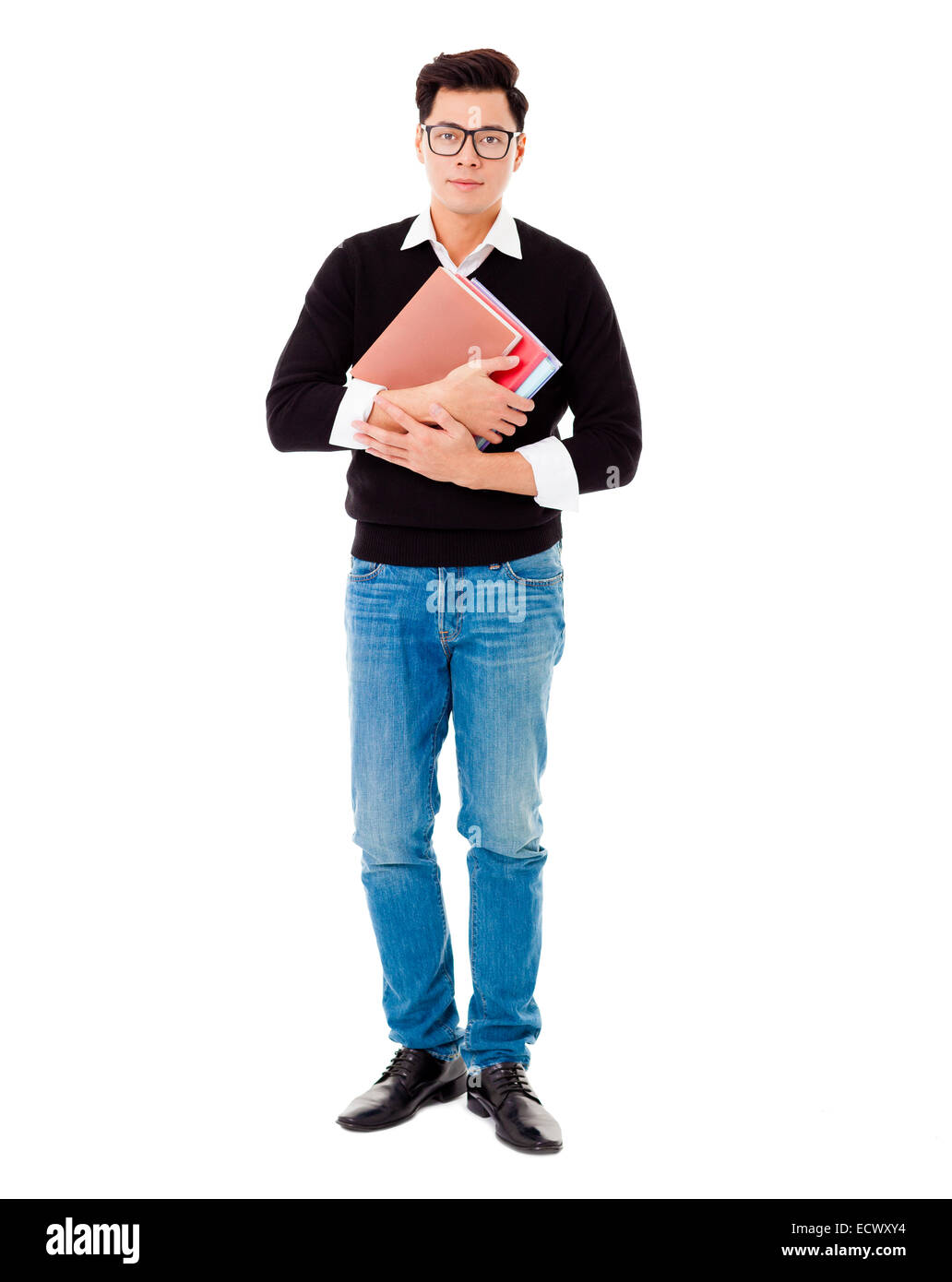 Full length portrait of smiling school boy holding books Stock Photo ...