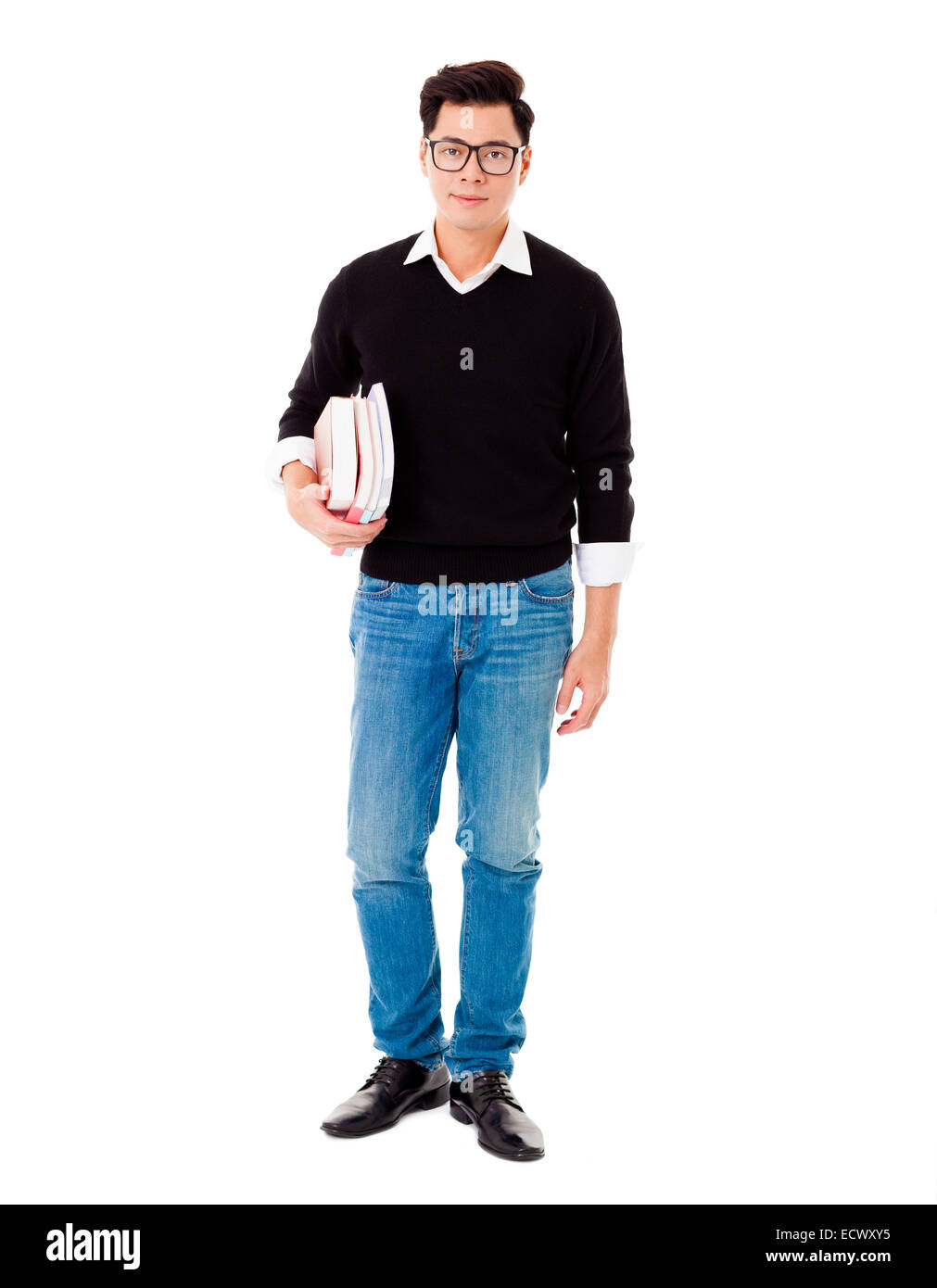 Full length portrait of smiling school boy holding books Stock Photo ...