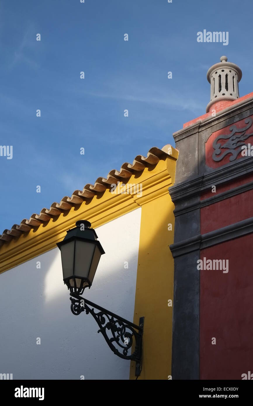 Detail of architecture in Algarve, street lamp and chimney. Portugal Stock Photo