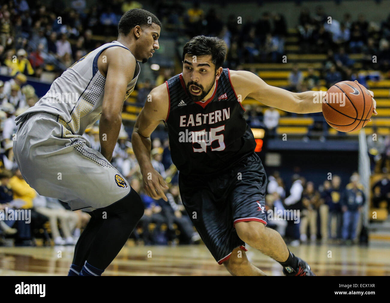 Berkeley, California, USA. 19th Dec, 2014. E. Washington F # 55 Venky Jois drive to the hoop pass Cal # 14 Christian Behrens during NCAA Men's Basketball game between Eastern Washington Eagles and California Golden Bears 67-78 lost at Hass Pavilion Berkeley Calif. Credit:  csm/Alamy Live News Stock Photo