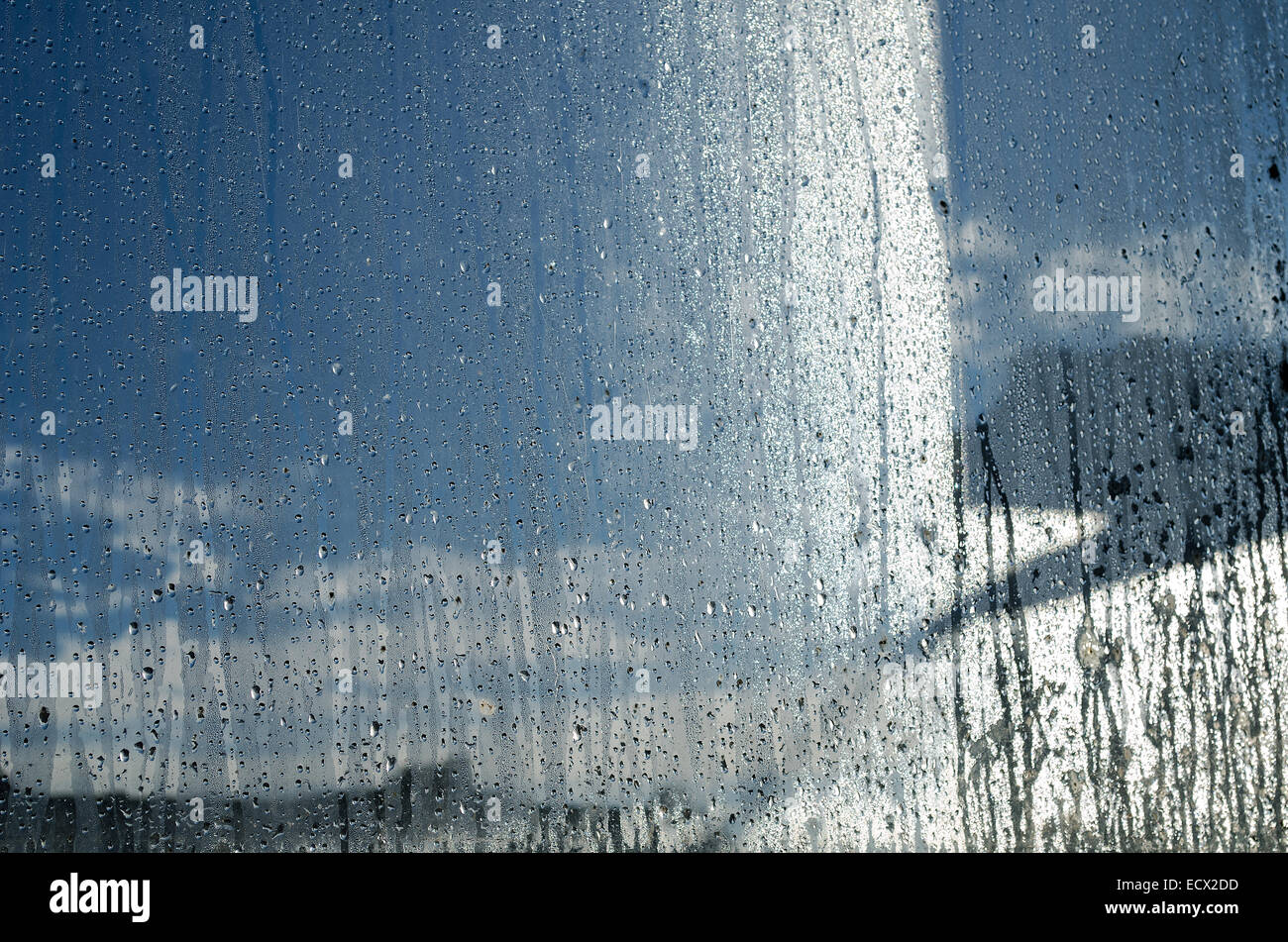 Closeup of natural water drop on glass background Stock Photo - Alamy