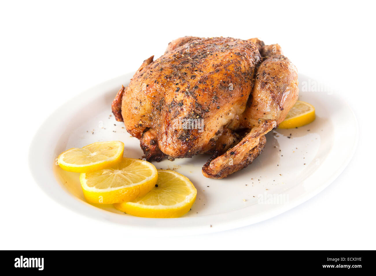 Roasted chicken hot on a plate white Stock Photo Alamy