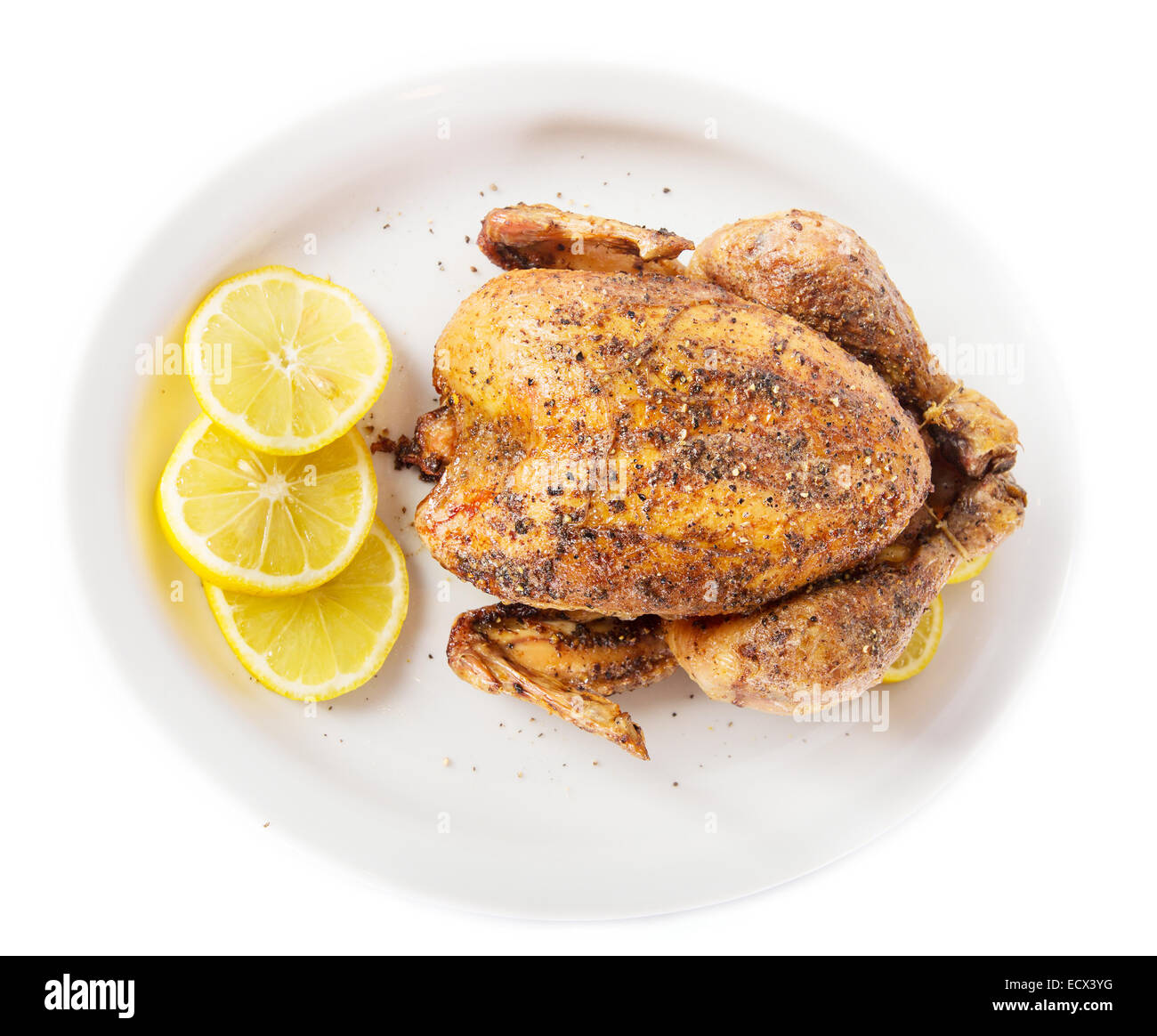Roasted chicken hot on a plate white Stock Photo Alamy