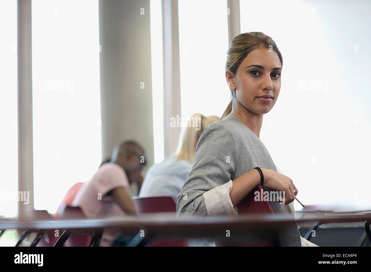Side view african girl sitting hi-res stock photography and images - Alamy