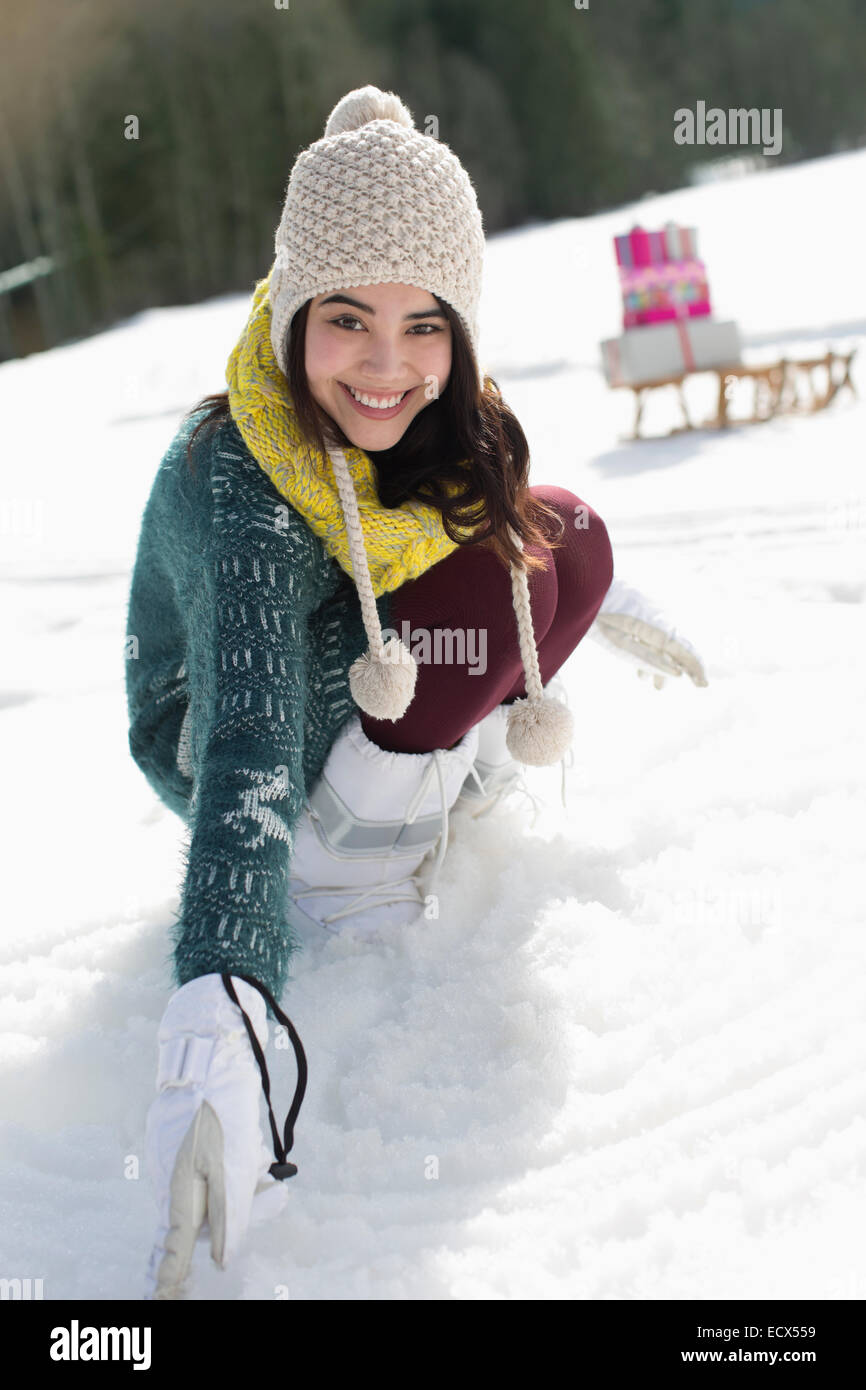 Portrait of smiling woman in snow Stock Photo - Alamy