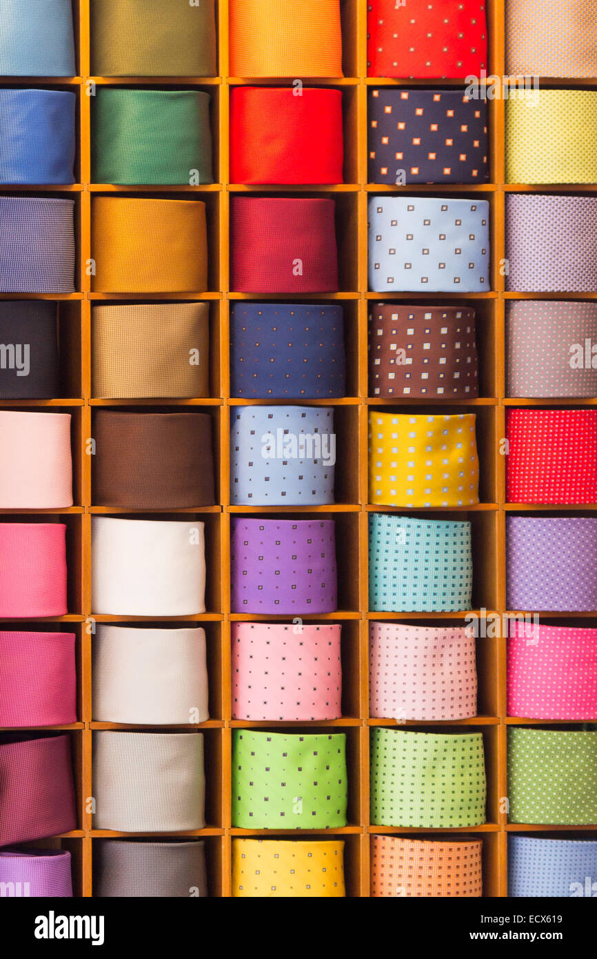 Colorful noname generic ties on display in a wooden shelf Stock Photo Alamy