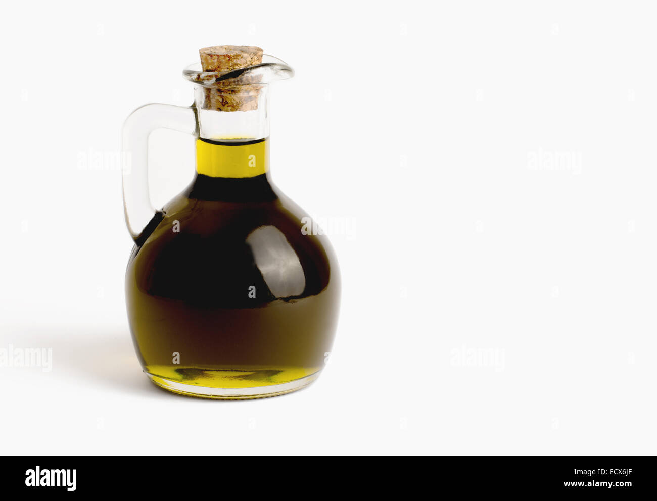 Jug of olive oil on a white background with copy space Stock Photo Alamy