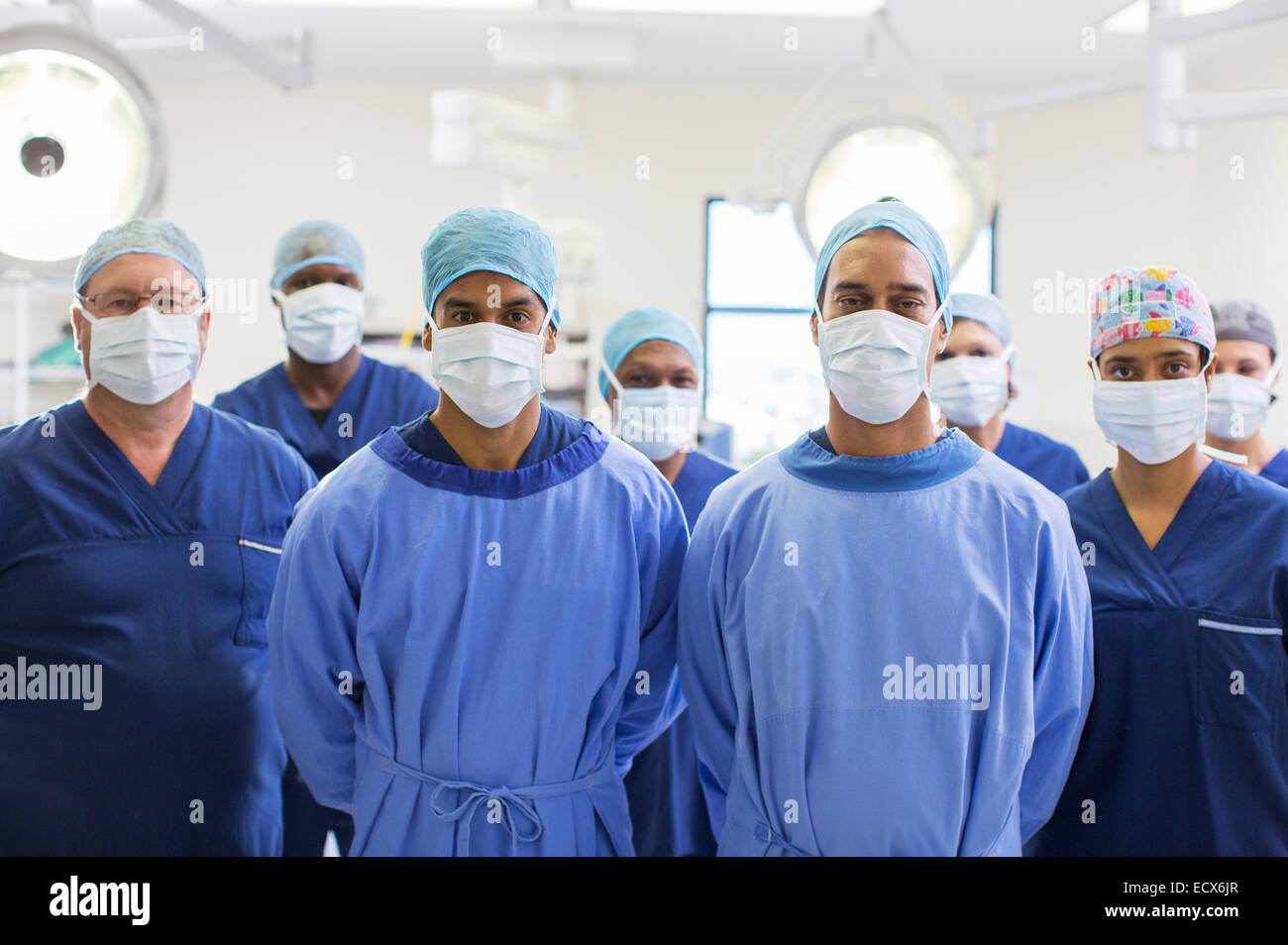 Team of surgeons in operating theater Stock Photo