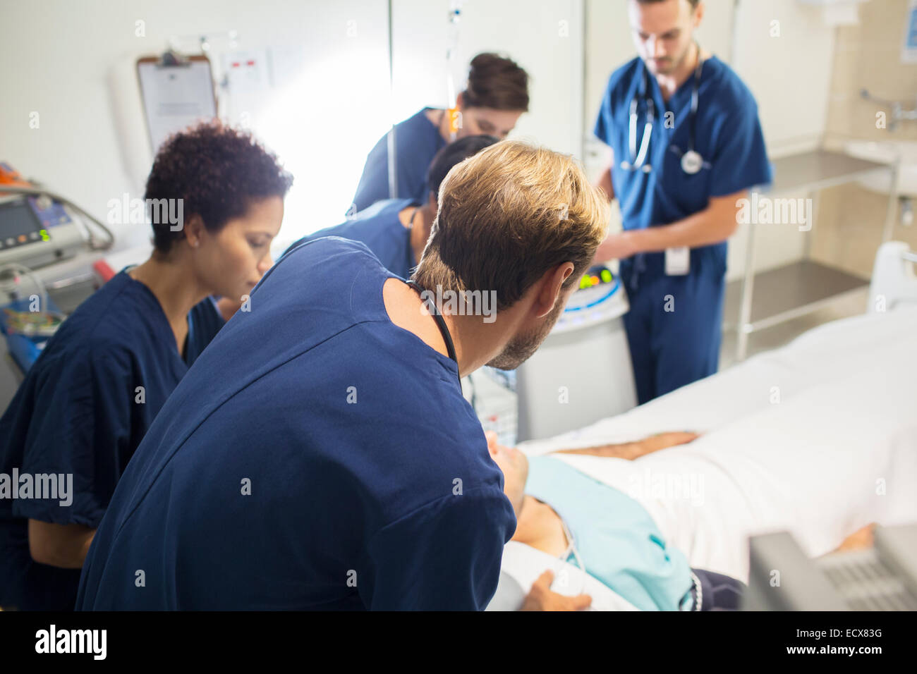 Doctor attending patient hires stock photography and images Alamy