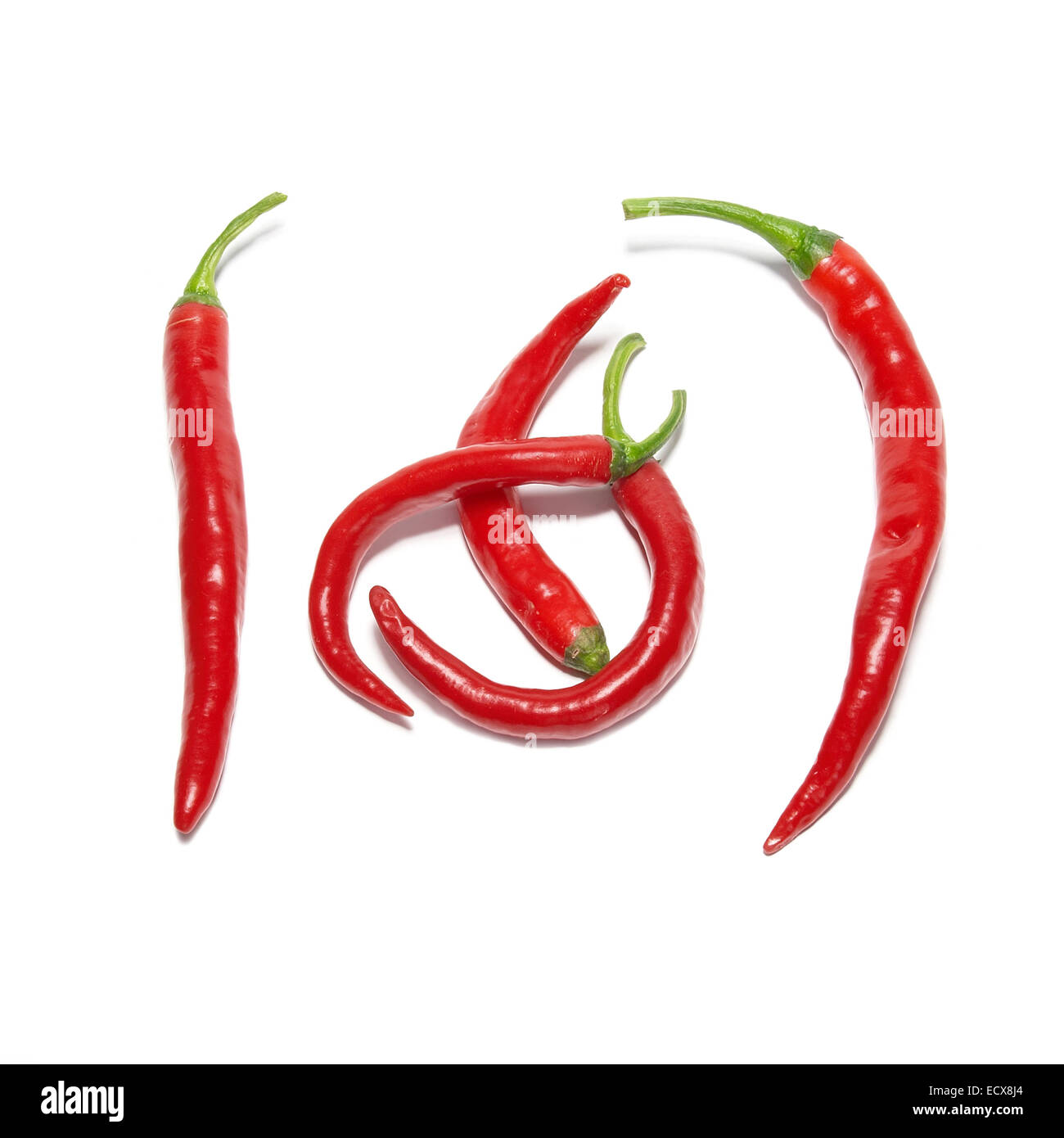 Red hot chili peppers isolated on white Stock Photo - Alamy