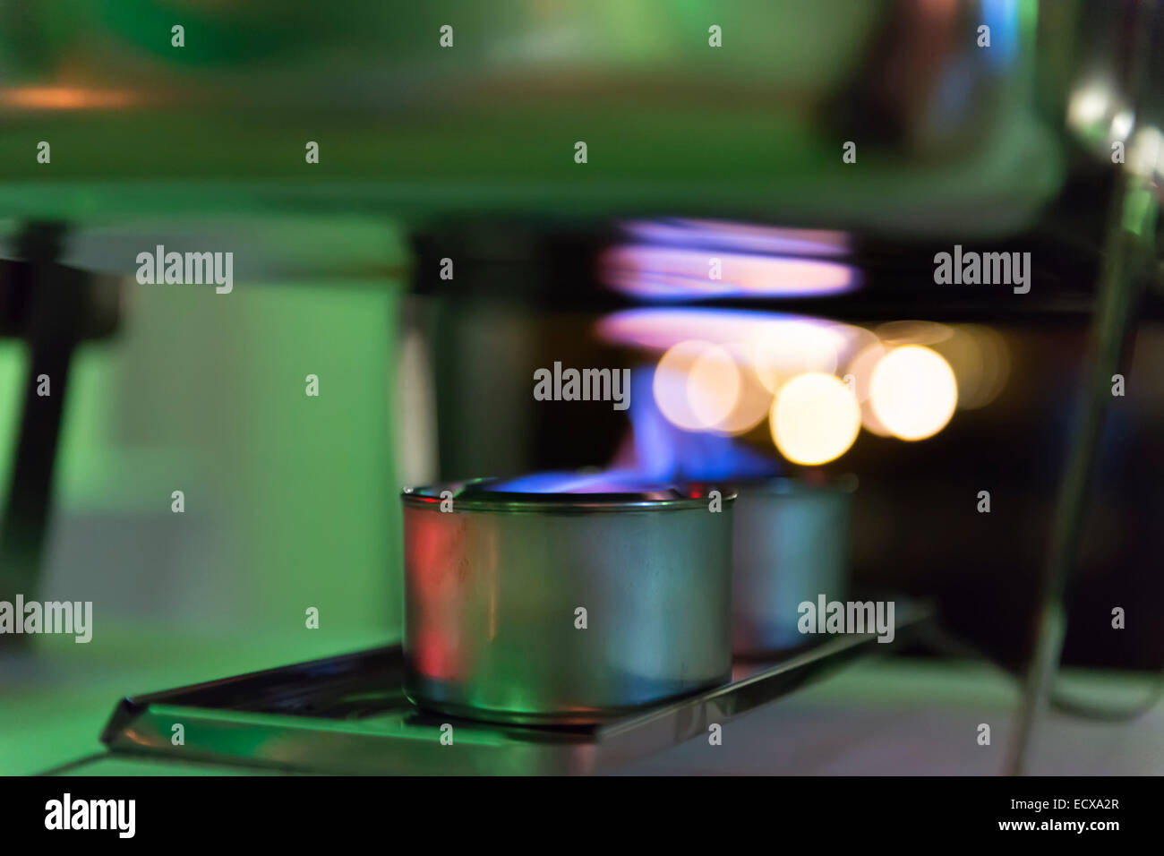 Alcohol stove with a hot plate of a catering Stock Photo Alamy