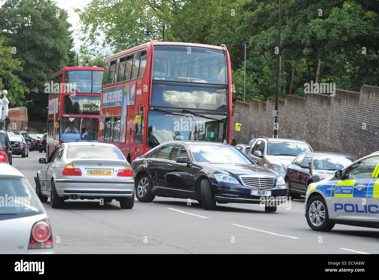 Two cars collide during afternoon traffic on Highgate Hill in North London  Where: London, United Kingdom When: 18 Jun 2014 Stock Photo
