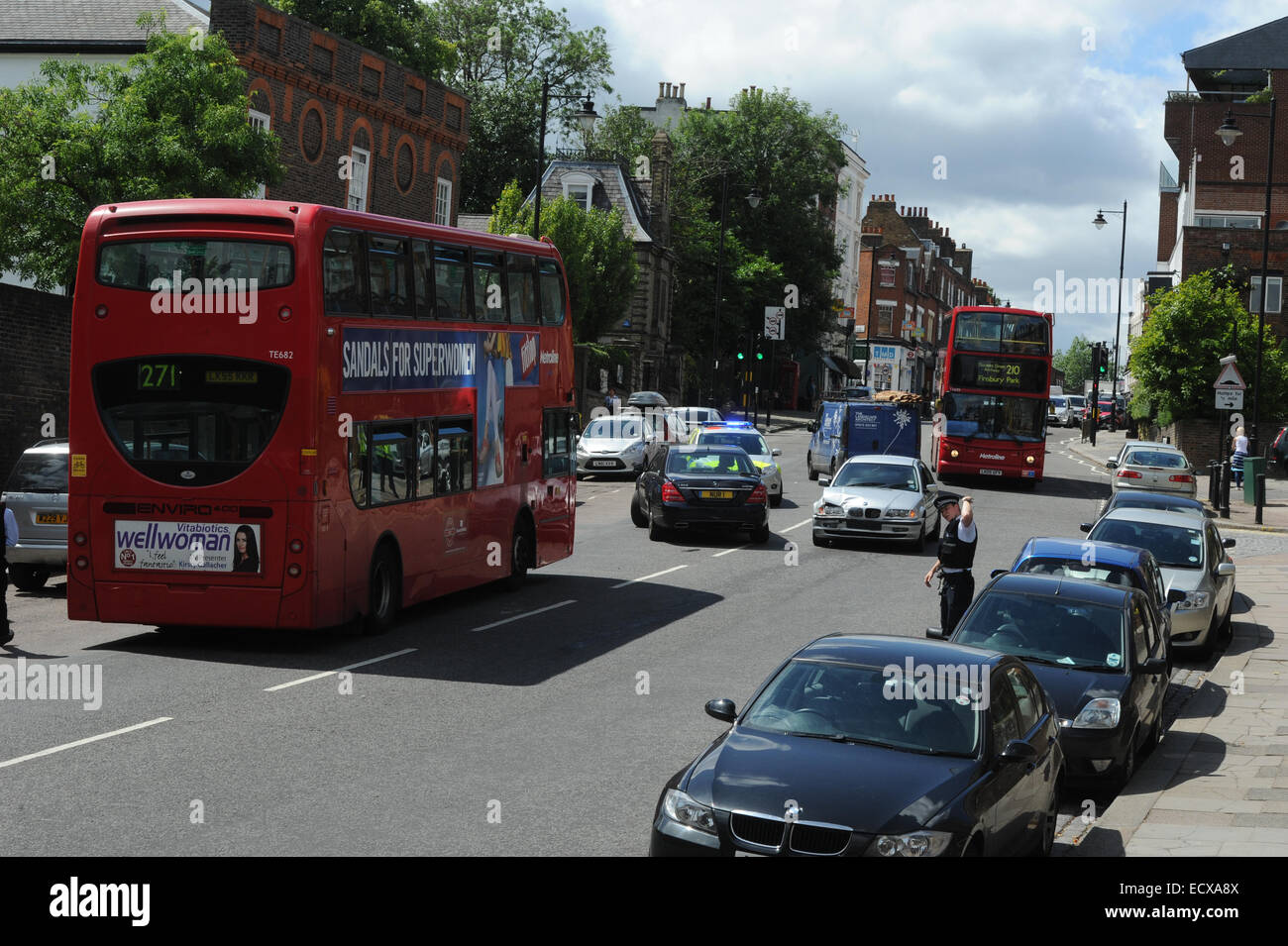 Two cars collide during afternoon traffic on Highgate Hill in North London  Where: London, United Kingdom When: 18 Jun 2014 Stock Photo