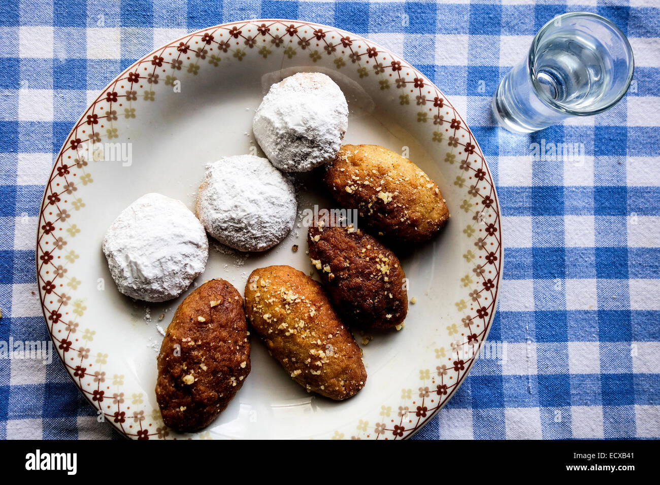 traditional greek christmas bisquits melomakarona kourabiedes and glass of raki tsikoudia stock image - Greek Christmas Food traditional greek christmas bisquits melomakarona kourabiedes and glass of raki tsikoudia stock image - Greek Christmas Food