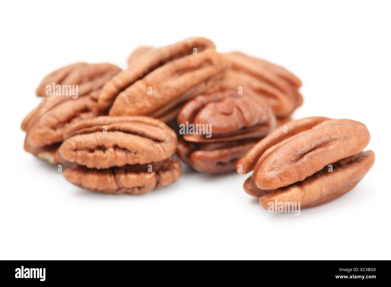 Peeled pecan nuts  isolated on white Stock Photo