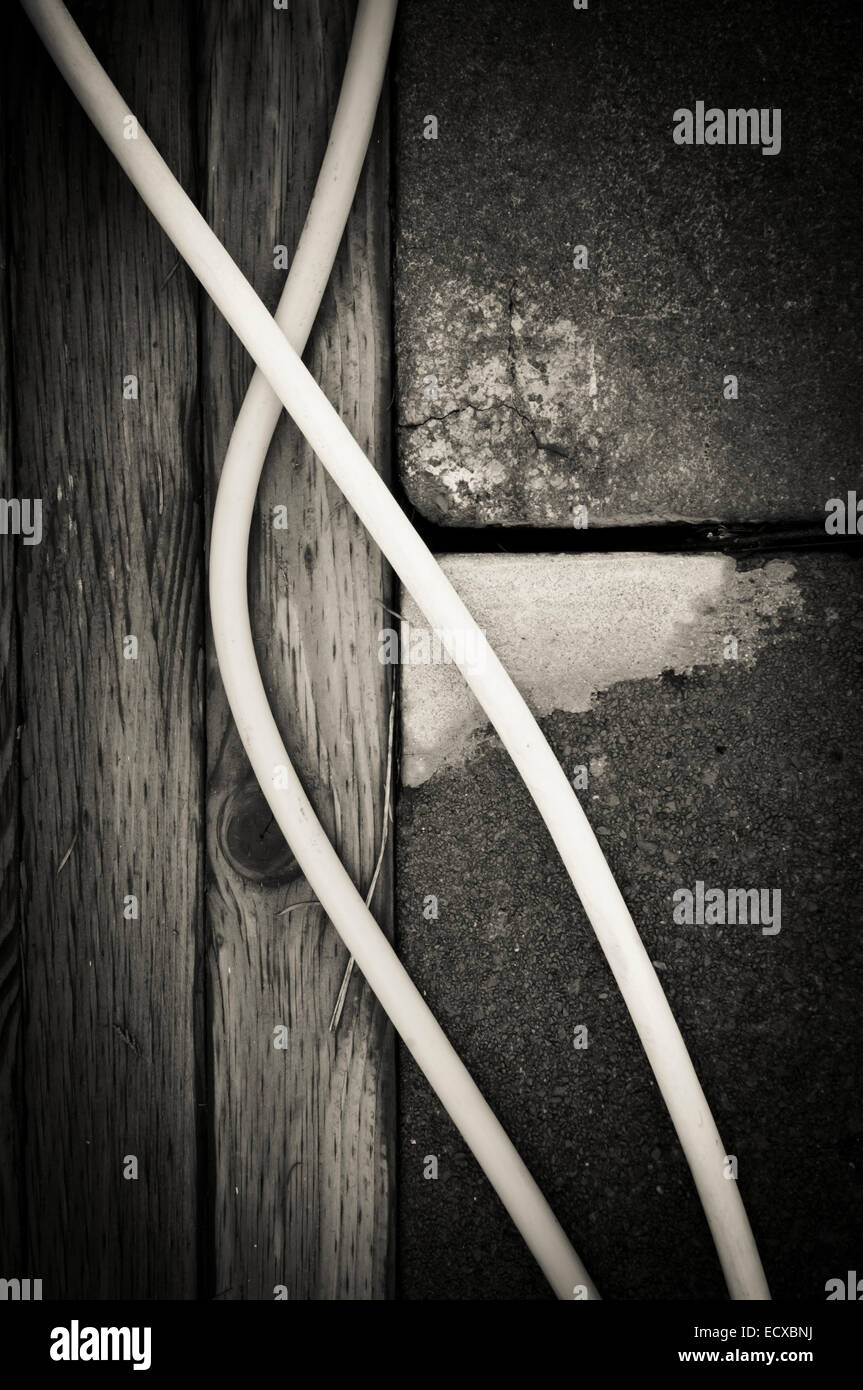 Hoses on a dock at a marina on the Puget Sound, Washington, USA Stock Photo