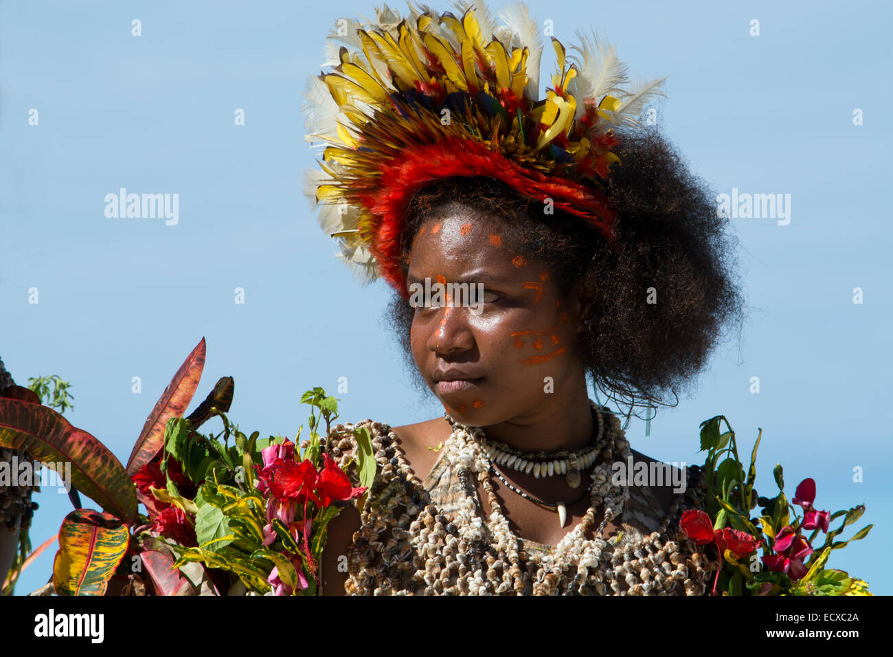 Melanesia, Papua New Guinea, Tufi. Village woman dressed in native singsing attire. Tufi is