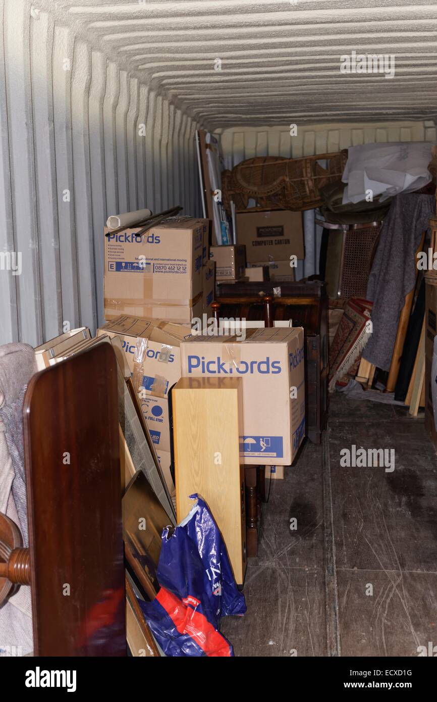household goods stored in a shipping container Stock Photo Alamy