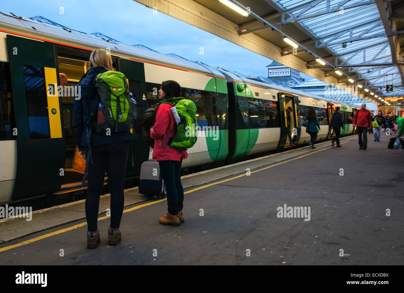 Passengers at railway train station in Eastbourne East Sussex England United Kingdom UK Stock Photo
