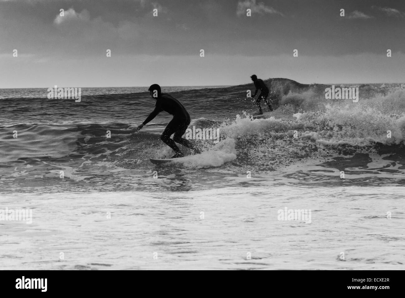 Good sea conditions allows a surfer to ride a good wave for a long run ...