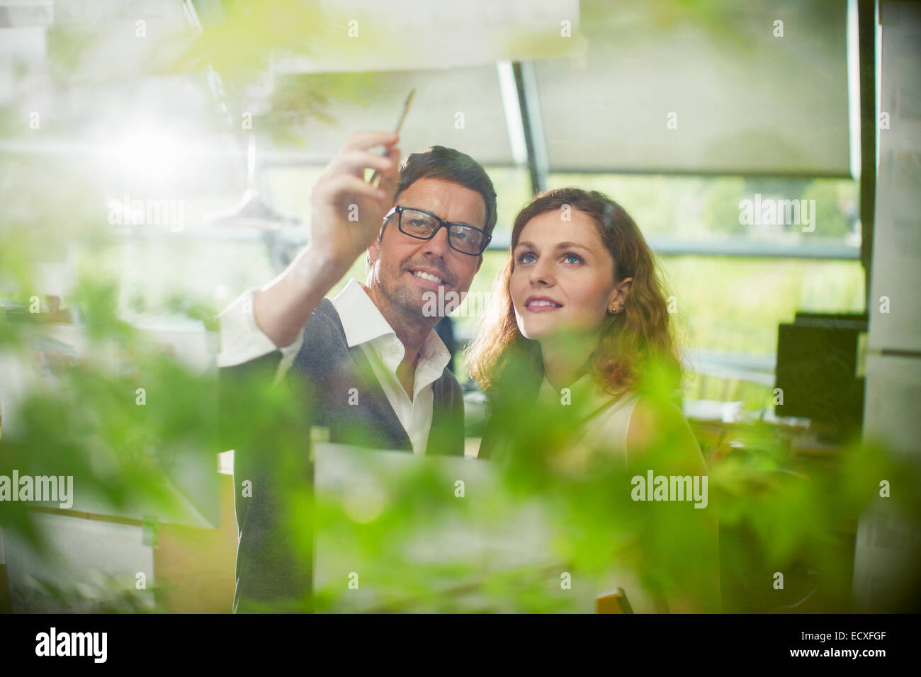 Business people working together in office Stock Photo - Alamy
