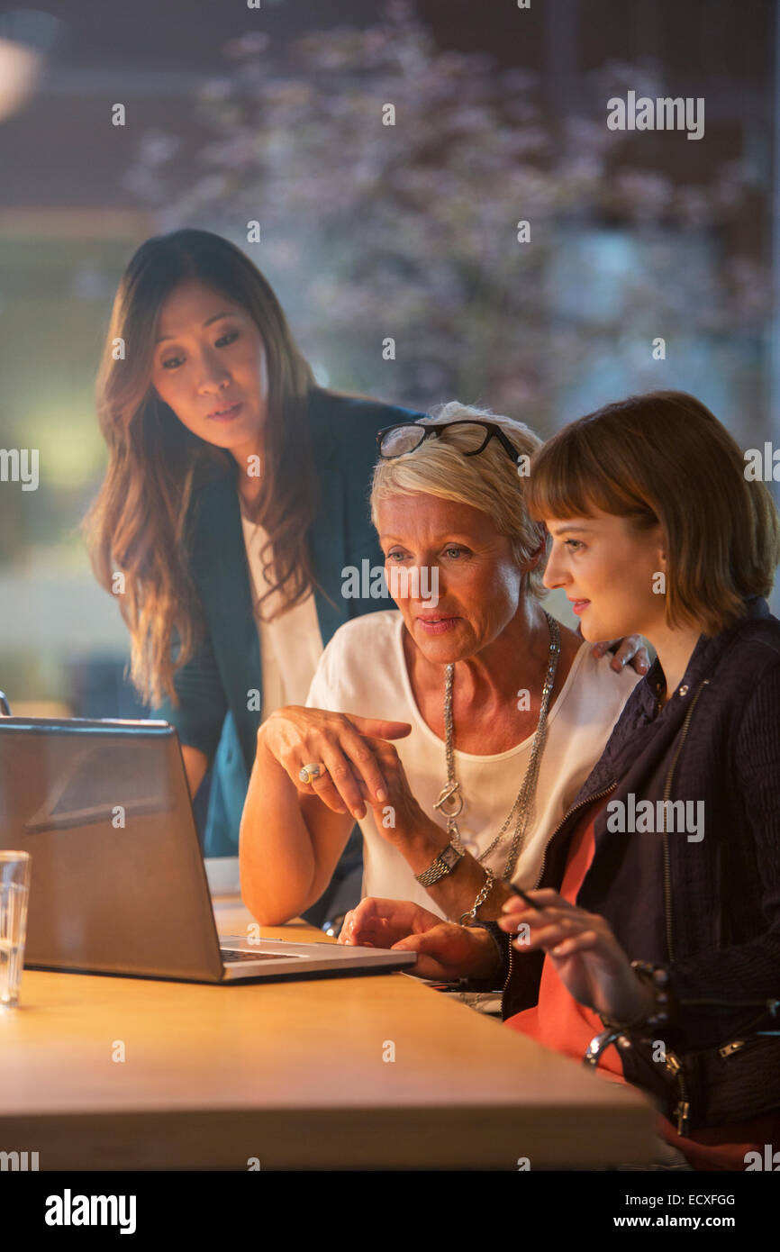Businesswomen working together in office meeting Stock Photo - Alamy