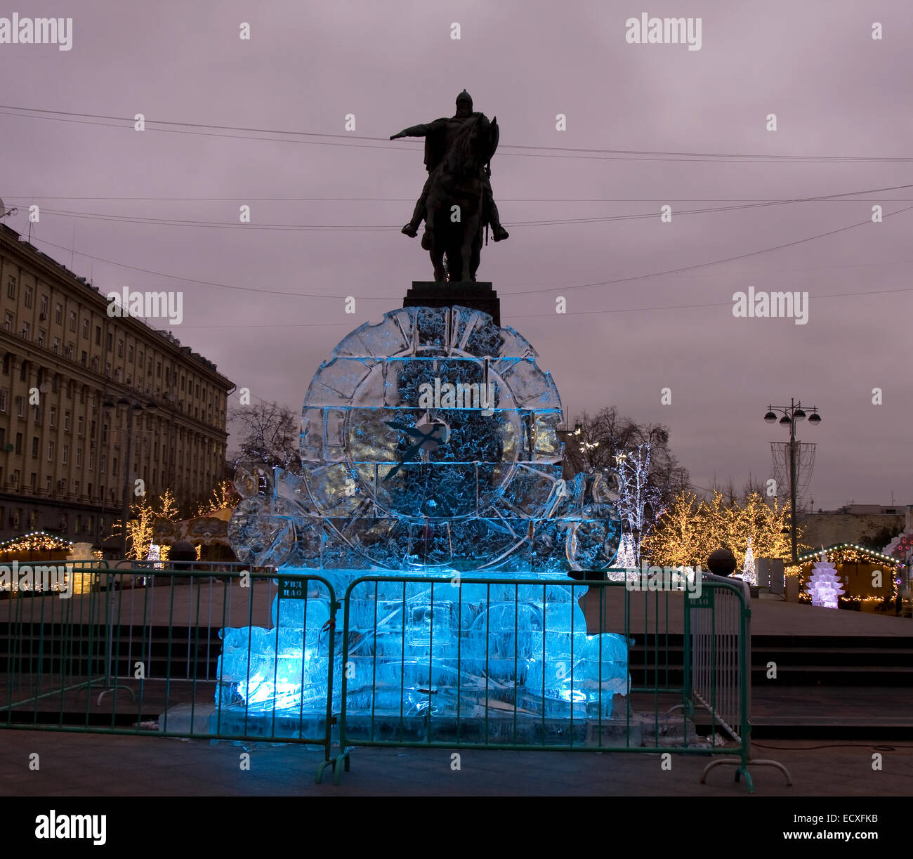 MOSCOW - DECEMBER 26, 2013: ice clock - decoration to Christmas and New Year holidays near monument to prince Yuriy Dolgorukiy o Stock Photo